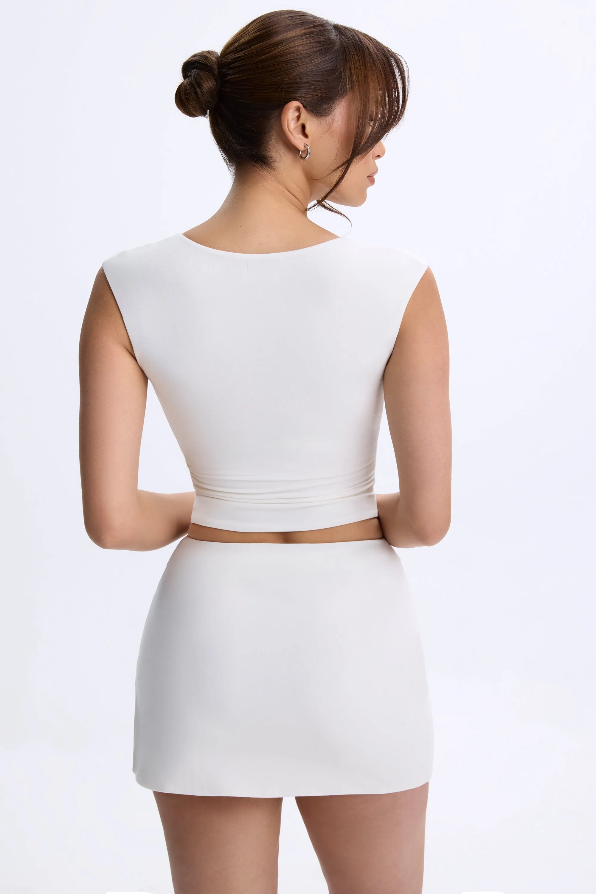 Mid-Rise Micro Mini Skirt in White sold by Oh Polly product image thumbnail 2