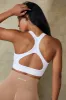 Cut Out Define Luxe Sports Bra in White sold by Oh Polly
