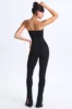 Petite Twist-Front Split Hem Flared Jumpsuit in Black sold by Oh Polly
