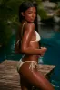 Side Tie Bikini Bottoms in White sold by Oh Polly