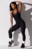 Petite Full Length Cut Out Back Unitard in Black sold by Oh Polly