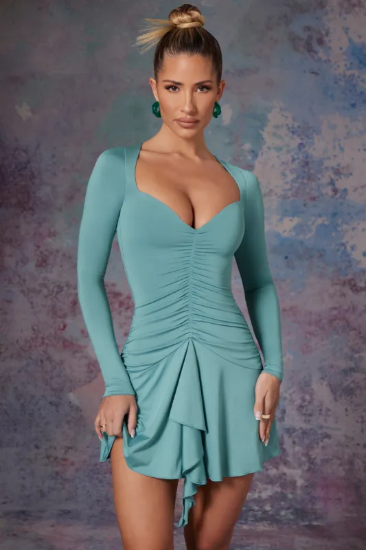 Long Sleeve Waterfall Skirt Mini Dress in Light Teal sold by Oh Polly