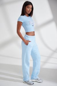 Petite Wide Leg Embroidered Back Joggers in Baby Blue sold by Oh Polly