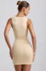 Slinky Jersey Cut-Out Ruffle-Trim Mini Dress in Buttercream sold by Oh Polly