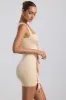 Slinky Jersey Cut-Out Ruffle-Trim Mini Dress in Buttercream sold by Oh Polly