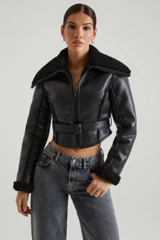 Jacket with Shearling Collar and Trim in Black sold by Oh Polly