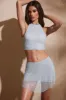 Embellished Mid Rise Mini Skirt in Aqua sold by Oh Polly