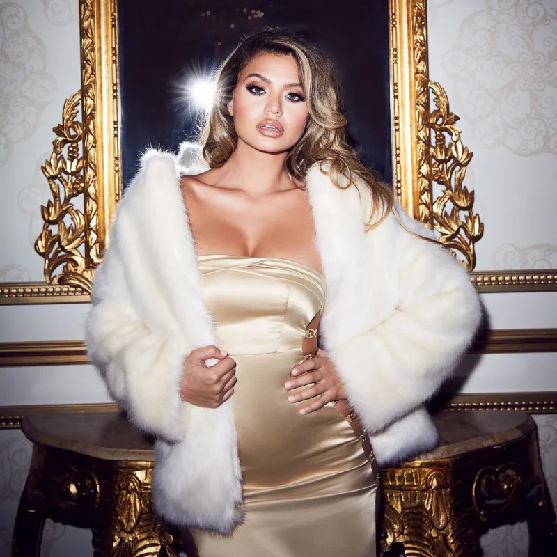 Teddy To Go Faux Fur Jacket in Cream sold by Oh Polly