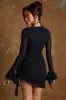 Lace Up Front Mini Dress in Black sold by Oh Polly