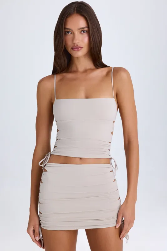 Ruched Cut-Out Mini Skirt in Taupe made by Oh Polly