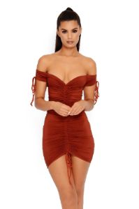 Pull On My Heartstrings Ruched Bardot Mini Dress in Rust sold by Oh Polly