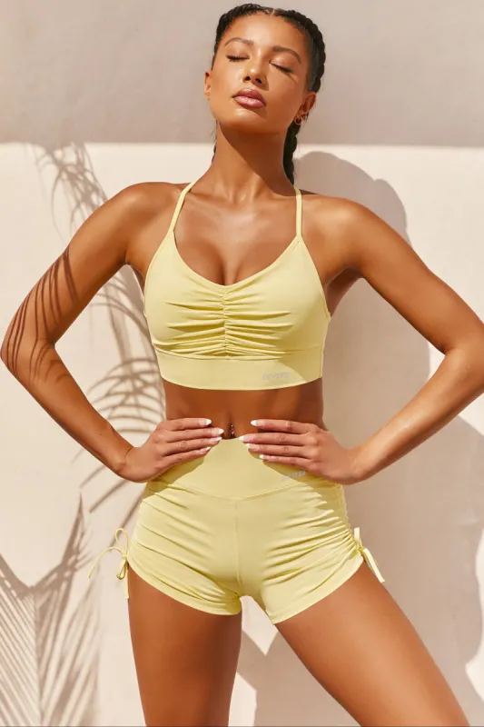 Focus Slinky Ruched Sports Bra in Yellow sold by Oh Polly
