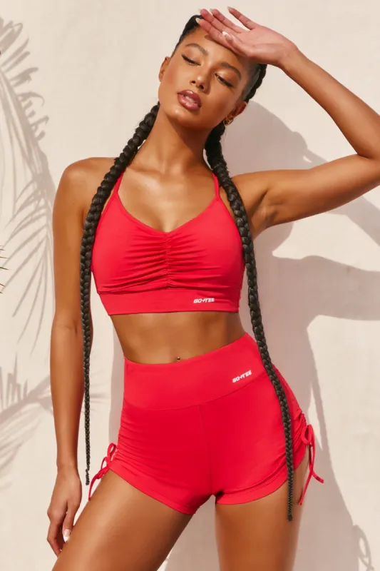 Focus Slinky Ruched Sports Bra in Red sold by Oh Polly