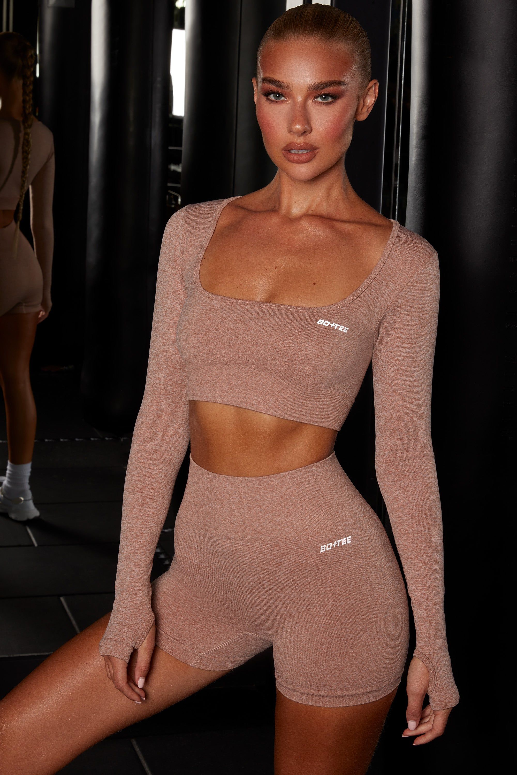 Motion Seamless Long Sleeve Crop Top in Brown sold by Oh Polly