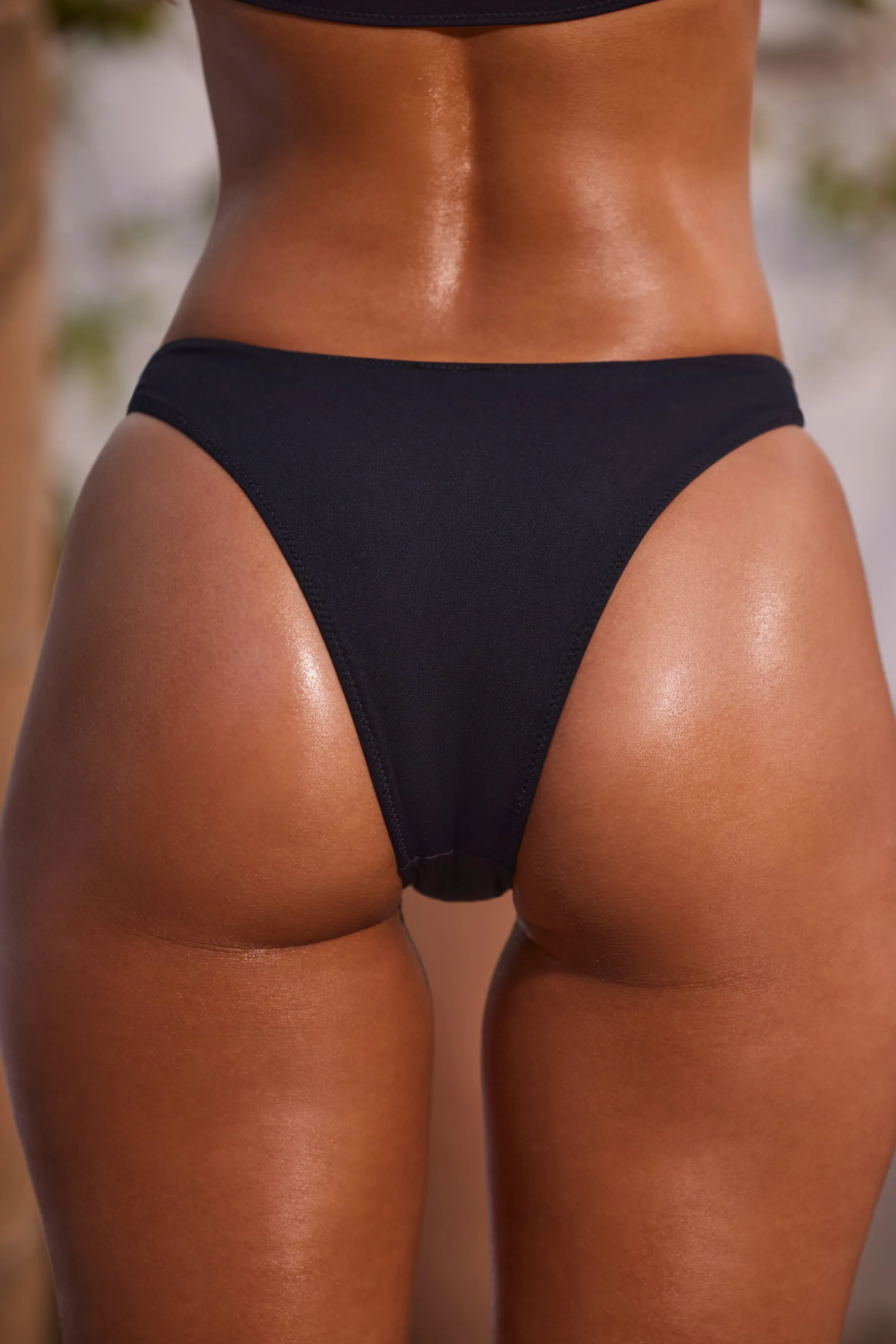 Mid Waist Hipster Bikini Bottoms in Black sold by Oh Polly product image thumbnail 5