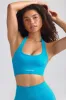 Define Luxe Halterneck Sports Bra in Turquoise Blue sold by Oh Polly