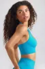 Define Luxe Halterneck Sports Bra in Turquoise Blue sold by Oh Polly