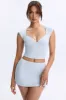 Ruched Cap-Sleeve Top in Dusty Blue sold by Oh Polly