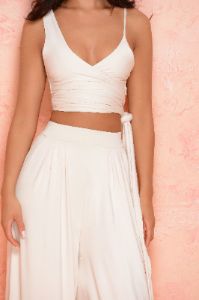 Under Wraps Wrap Over Crop Top in Cream sold by Oh Polly