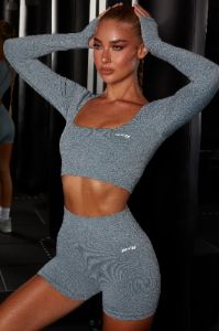 Motion Seamless Long Sleeve Crop Top in Blue sold by Oh Polly