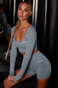 Motion Seamless Long Sleeve Crop Top in Blue sold by Oh Polly