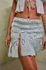 Shirred Thigh High Split Mid Rise Mini Skirt in Pastel Green sold by Oh Polly