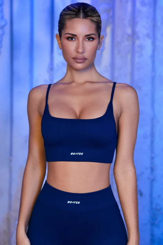 Strappy Sports Bra in Navy sold by Oh Polly