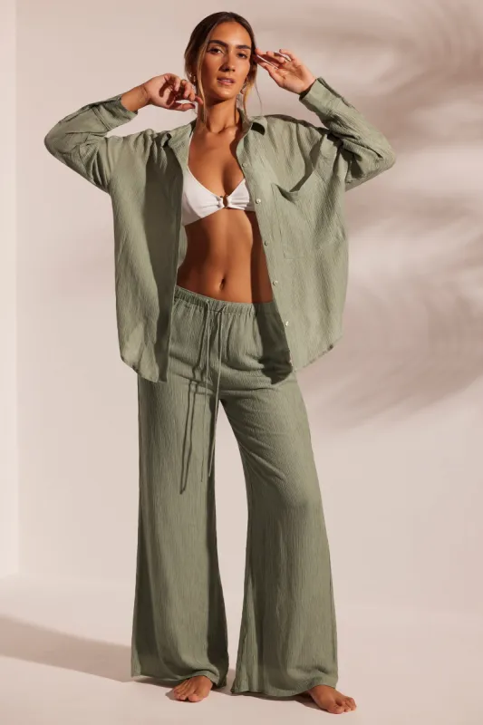 Crinkle Textured Oversized Beach Shirt in Light Green sold by Oh Polly