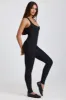 Petite Ribbed Modal Lace-Trim Jumpsuit in Black sold by Oh Polly