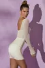 Long Sleeve Mesh Corset Mini Dress in White sold by Oh Polly