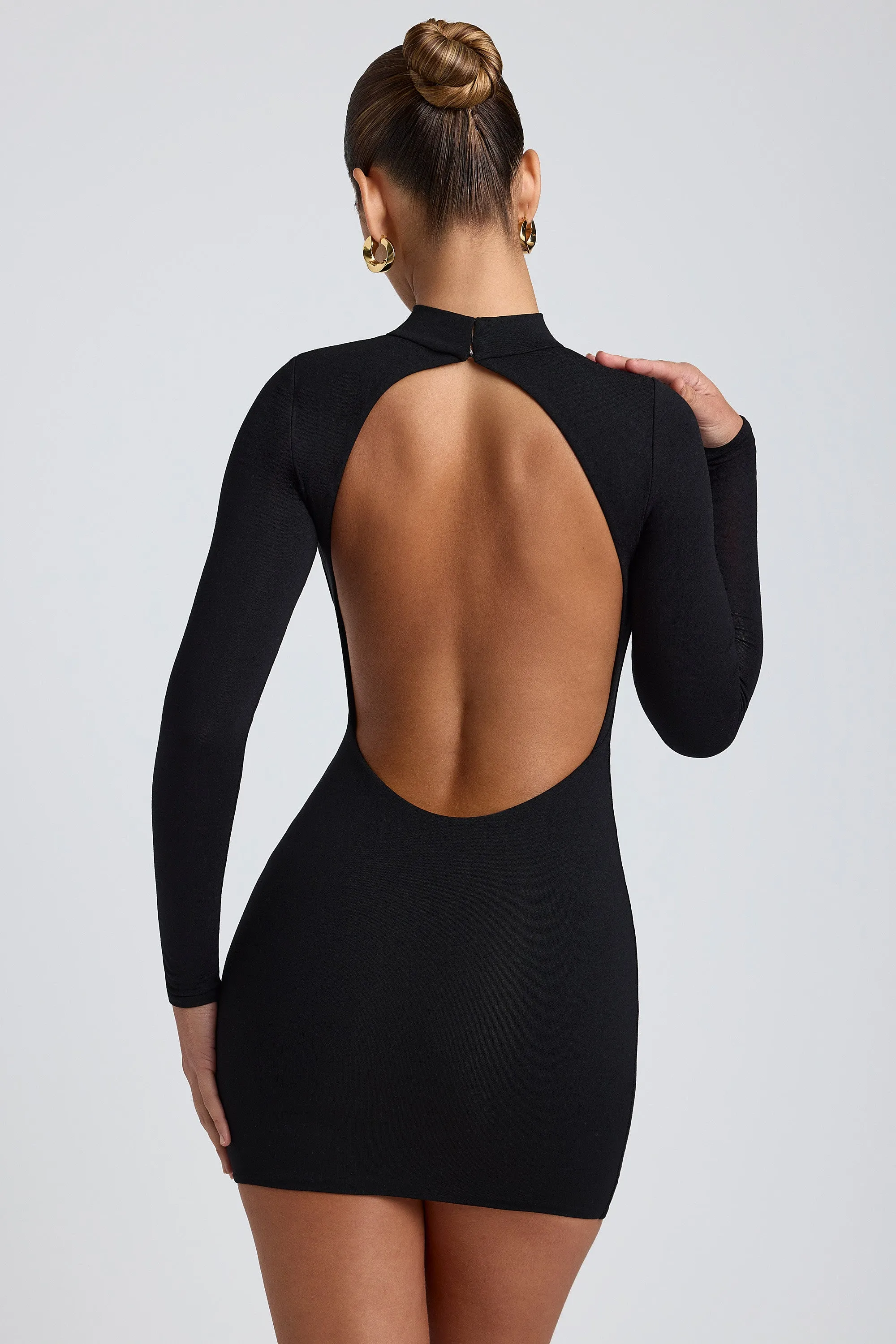 Modal Open-Back Long-Sleeve Mini Dress in Black sold by Oh Polly