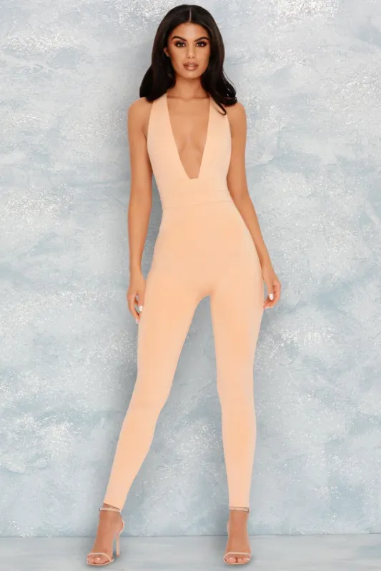 Sleek In The Sheets Extreme Plunge Ankle Length Jumpsuit in Apricot sold by Oh Polly