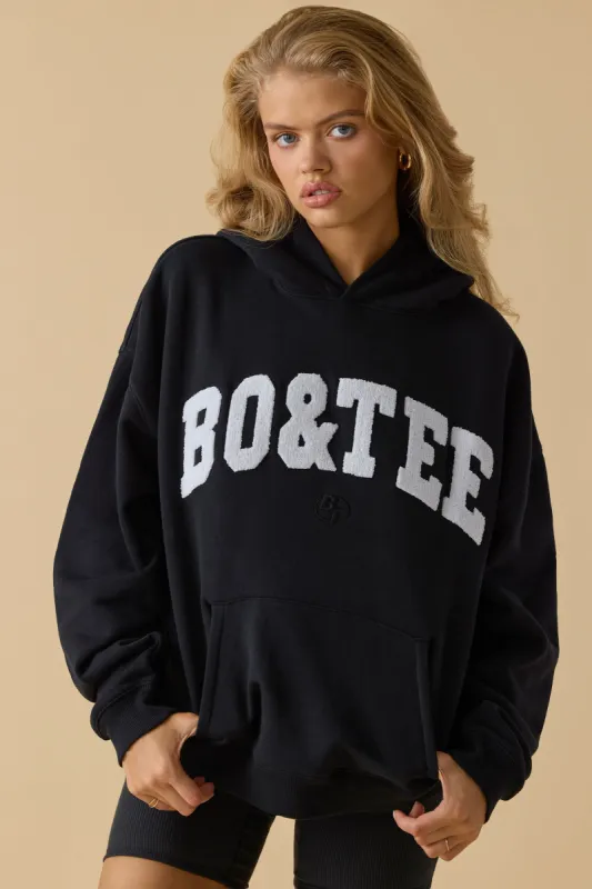 Oversized Hooded Sweatshirt in Black sold by Oh Polly