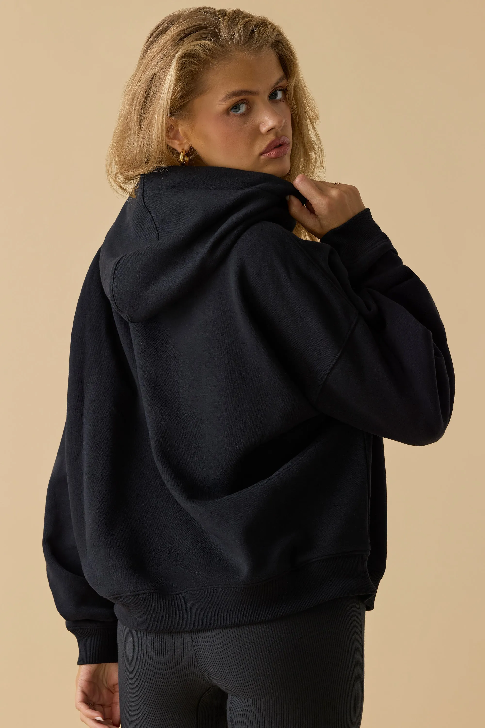 Oversized Hooded Sweatshirt in Black sold by Oh Polly product image thumbnail 2