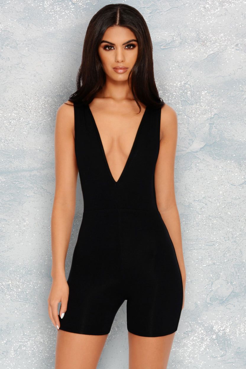 Deep Feelings Extreme Plunge Unitard Playsuit in Black sold by Oh Polly