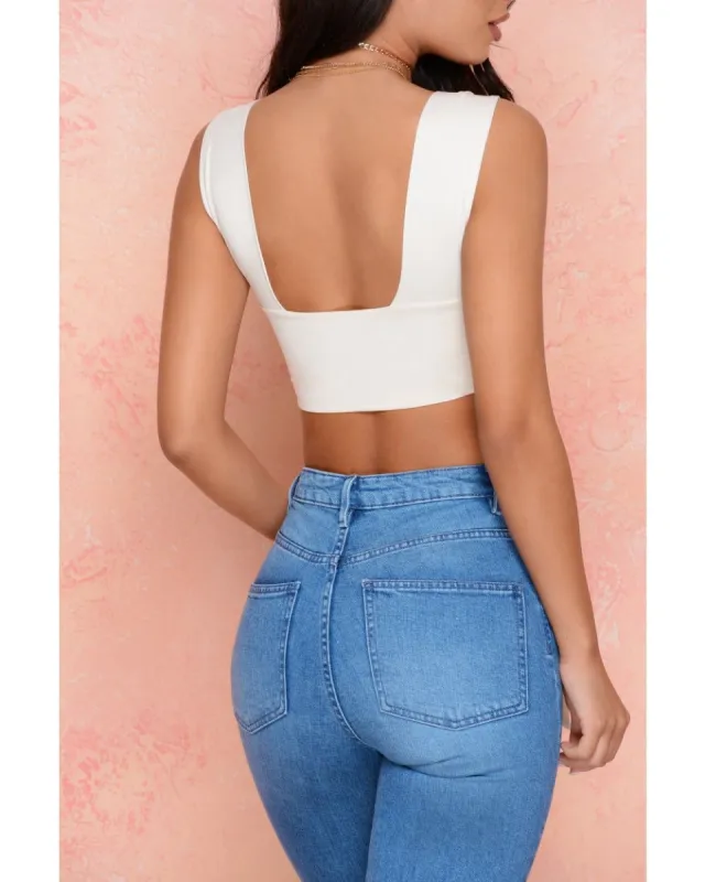 Twist My Words Strappy Twist Front Crop Top in Cream sold by Oh Polly