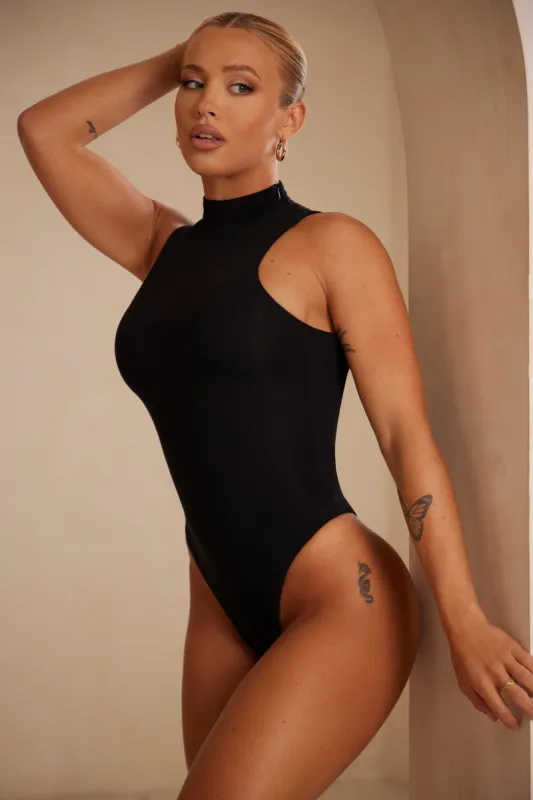 High Neck Bodysuit in Black sold by Oh Polly