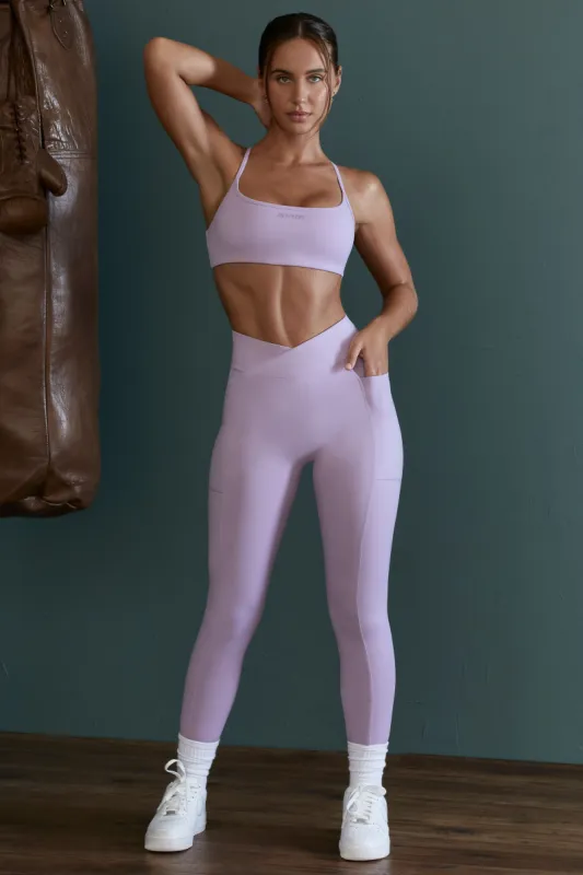 High Waist Wrap Over Leggings in Lilac sold by Oh Polly