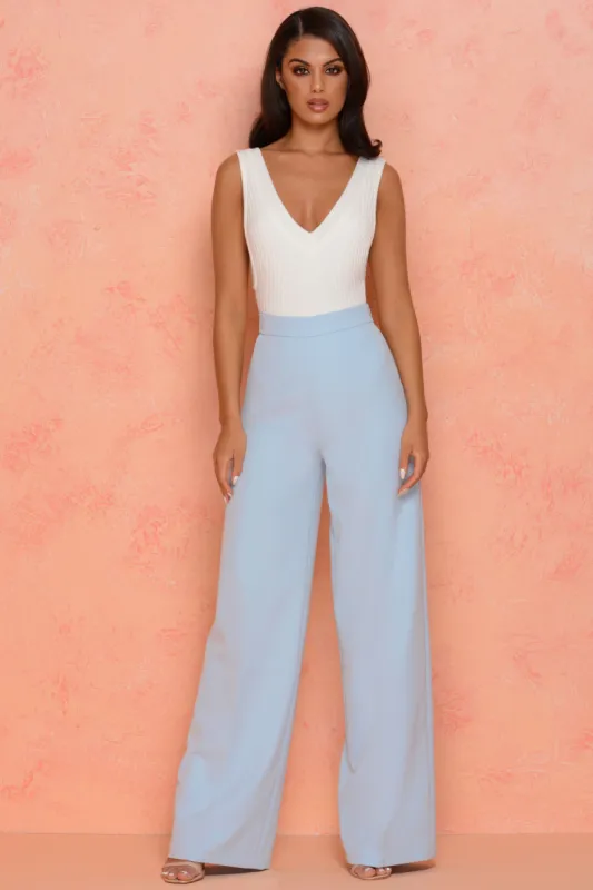 Knit Or Miss Scoop Back Ribbed Thong Bodysuit in Cream sold by Oh Polly