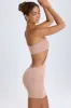 Bandeau Cut-Out Mini Dress in Warm Peach sold by Oh Polly