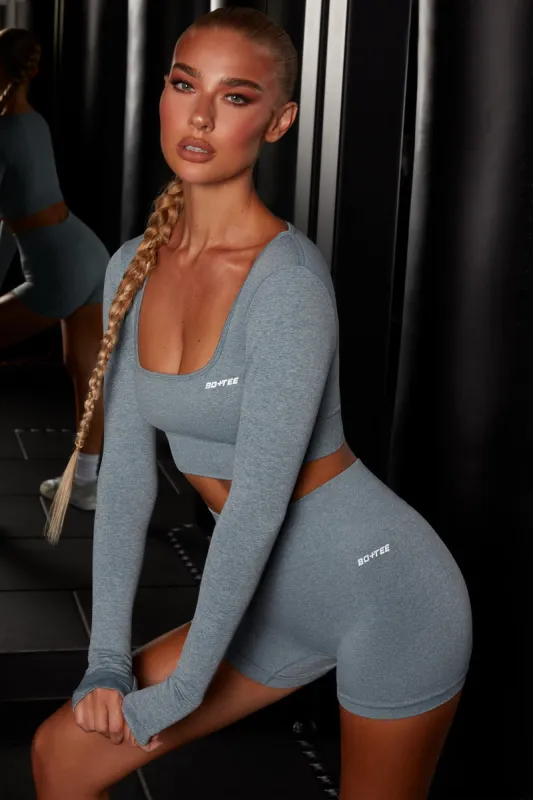 Motion Seamless Long Sleeve Crop Top in Blue sold by Oh Polly