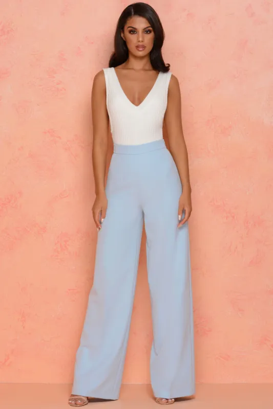 Thrill Wide High Waisted Flared Wide Leg Trousers in Light Blue sold by Oh Polly