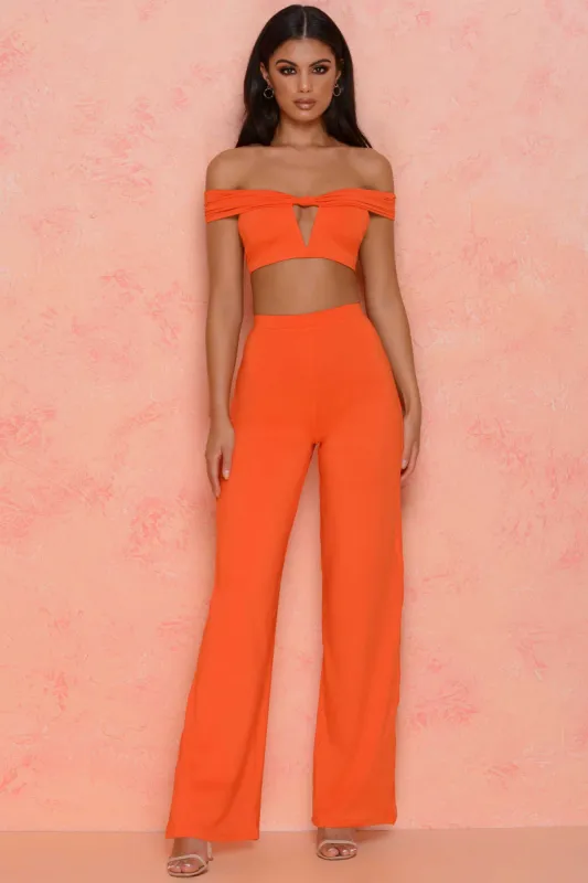 Low Key High Waisted Trousers in Orange sold by Oh Polly