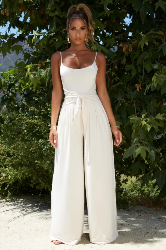 Long Way Down Petite Wide Leg Jumpsuit in Ivory sold by Oh Polly