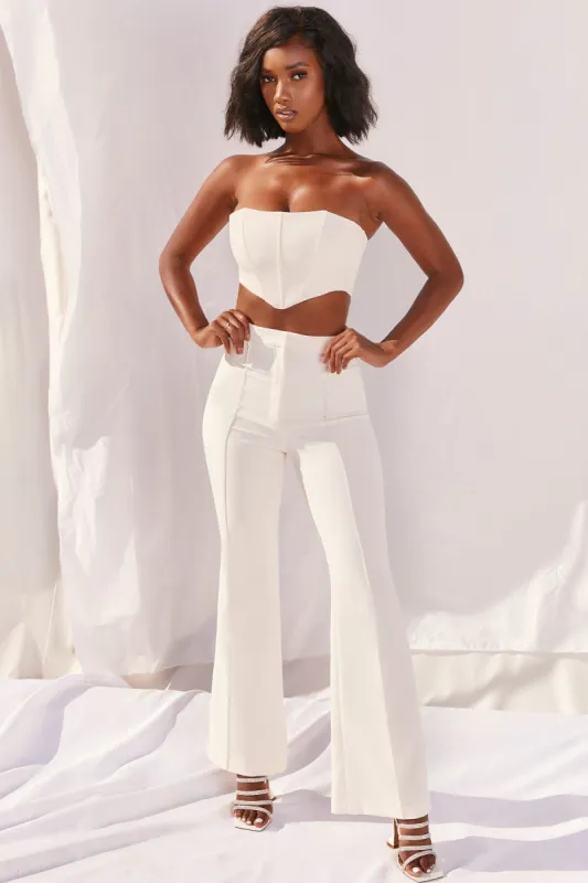 Bossin’ Up Strapless Corset Crop Top in Ivory sold by Oh Polly