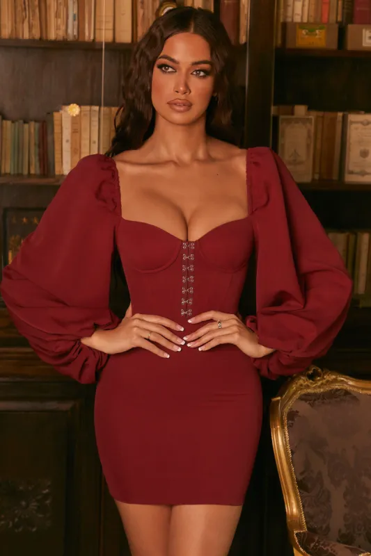 Haute Nights Balloon Sleeve Corset Mini Dress in Burgundy sold by Oh Polly