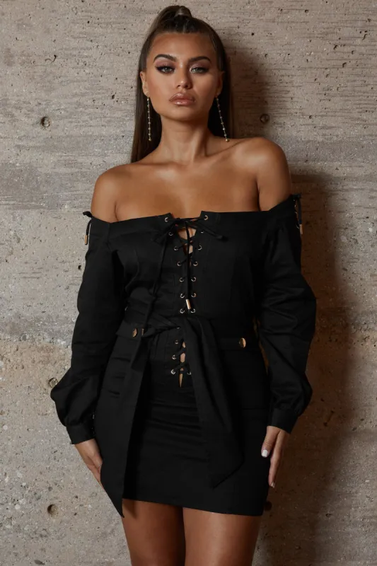Tongue Tied Off The Shoulder Mini Dress in Black sold by Oh Polly