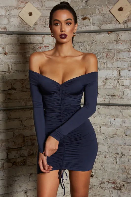 Get Down Tonight Long Sleeve Ruche Bardot Mini Dress in Midnight Blue sold by Oh Polly