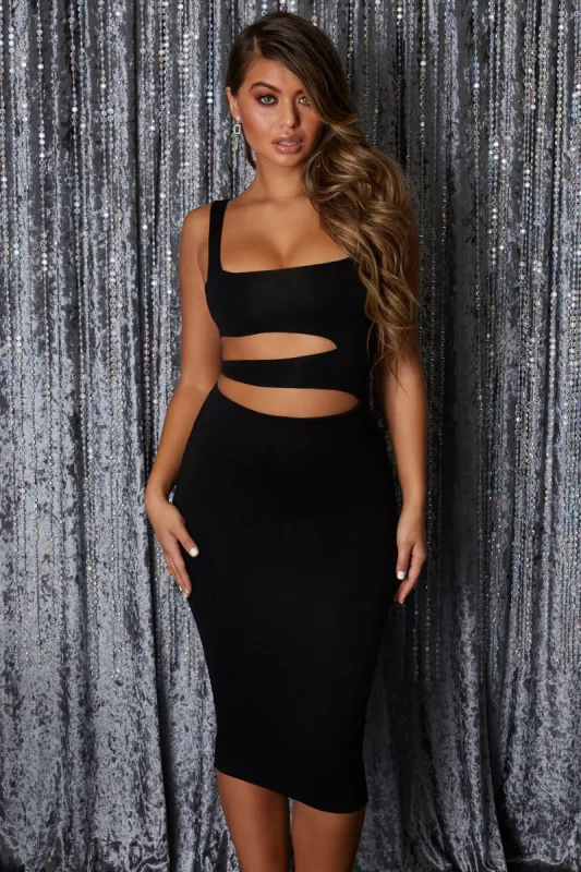 Make The Cut Strappy Asymmetric Midi Dress in Black sold by Oh Polly