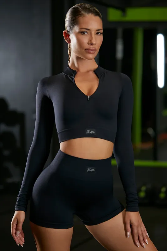 Long Sleeve Crop Top in Black sold by Oh Polly